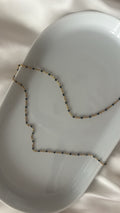 Chaîne à perles noires