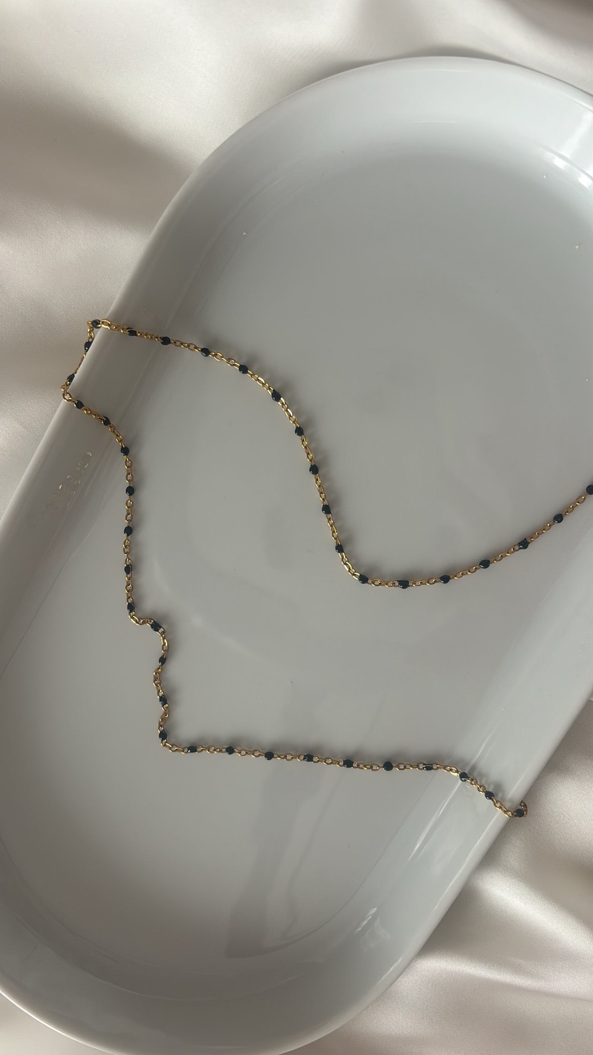 Chaîne à perles noires