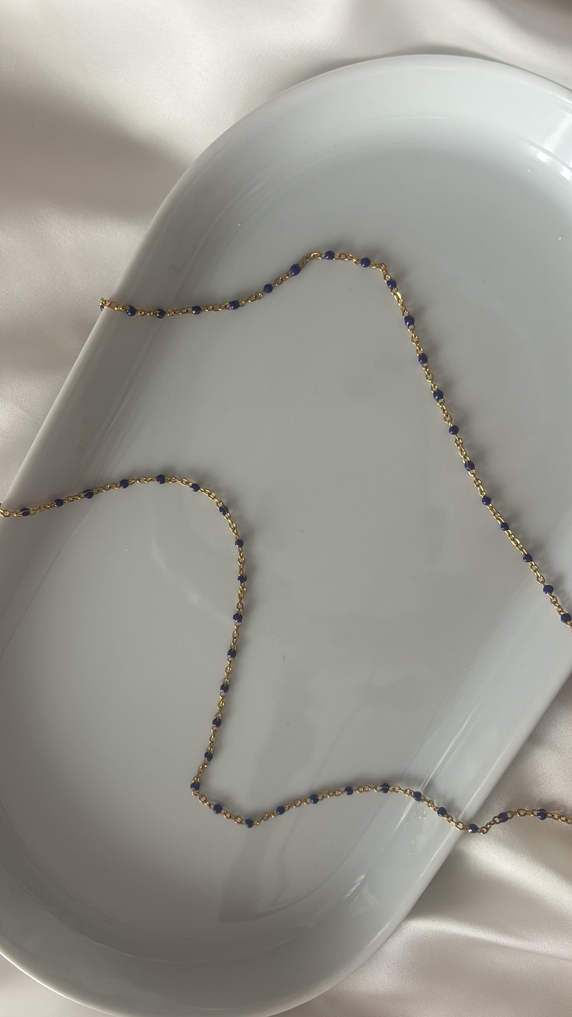 Chaîne à perles violettes